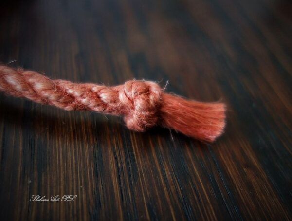 shibari rope in salmon brick orange by ShibariArt.PL - thistle knot ends